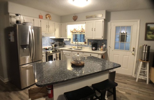 Covington Cabin | Cabin on the Jackson River with dock, deck, firepit and sauna. Pet friendly!