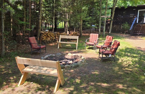 Eagle River House | Cabin on Voyageur Lake–2BR Retreat on ER Chain w/Deck, Firepit & Sandy Beach!