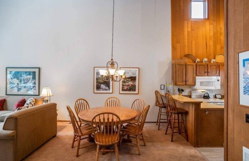 Mammoth Lakes Cabin | Cabin with vaulted ceilings, woods view, and central hot tub just 2 blocks to lifts