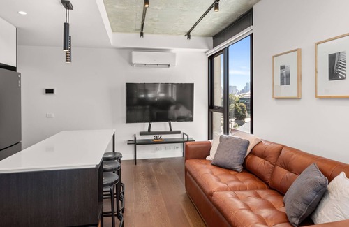 Cremorne Apartment | Camillea - One-bedroom fifth-floor residence with MCG and city views.