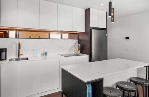 Cremorne Apartment | Camillea - One-bedroom fifth-floor residence with MCG and city views.