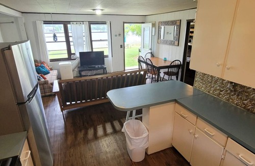 Alto Apartment | Campau Lake Sunshine, hot swim spa tub, King Bed lakefront