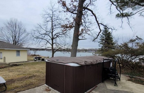 Alto Cottage | Campau Lake swim pool hot swim pool spa, game room