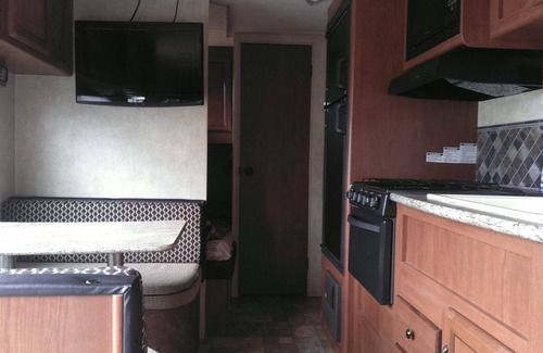 Waresboro Resort | Camper near pool at Pebble Hill RV Resort
