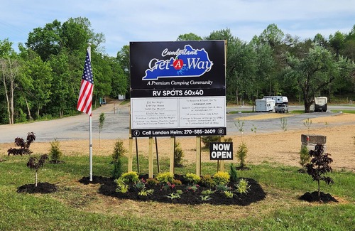 Jamestown RV Rental | Camper on campsite
