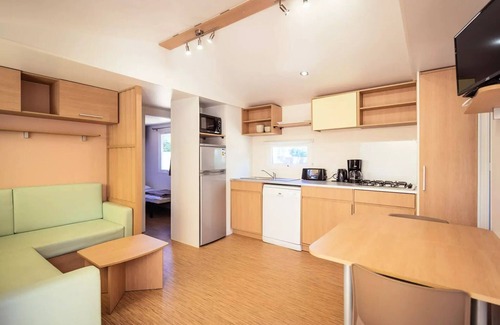 Brissac-Quince House | Camping de l'Etang Sites and Landscapes * - Privilege Cottage 3 ch. - TV - LV 8 persons