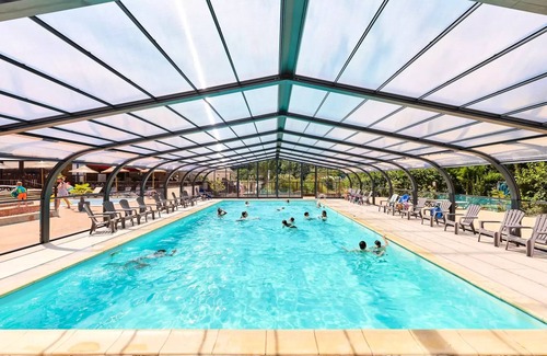 Brissac-Quince House | Camping de l'Etang Sites and Landscapes * - Cottage Classic Authion 2 ch. 5 persons