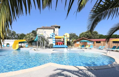 L'Aiguillon-sur-Vie House | Camping Ushuaïa Le Parc de La Grève * - Mobile Home Compact 3 Rooms 2 People + TV
