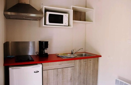 Nabirat Ski Chalet | Camping Ushuaïa Villages les Pialades * - Chalet Cajou 24m² with covered terrace - 1 bedroom for 2 people