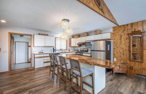 Canadian Lakes House | Canadian Lakes, Michigan beach home on private lakenn