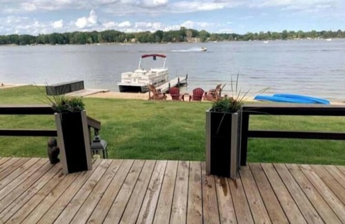 Canadian Lakes House | Canadian Lakes, Michigan beach home on private lakenn