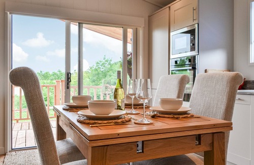 Rowrah Cottage | Canadian timber lodge with direct views to the Alpacas.