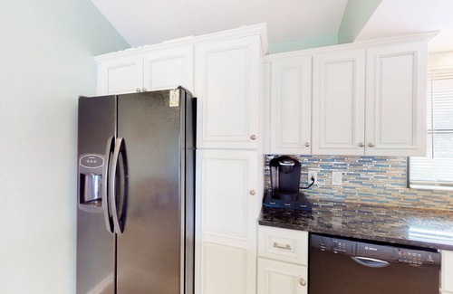 Charlotte Park House | Canal-front home with private dock, pool, screened lanai, & W/D
