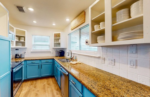 Spanish Grant House | Canal view retreat with vaulted ceilings & three-story observation deck