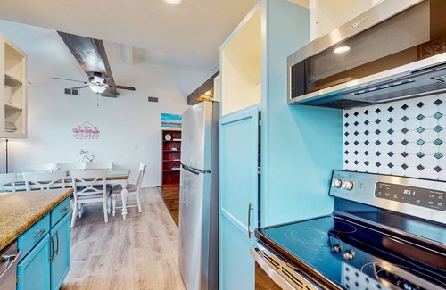 Spanish Grant House | Canal view retreat with vaulted ceilings & three-story observation deck