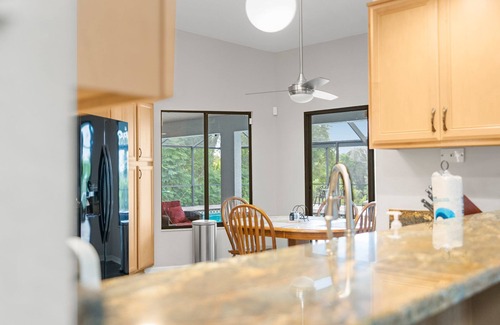 Spring Hill House | Candida's RetreatnSleeps 8 Guests :n3 Bedrooms, 5 Beds, 2 Full BathsnHeated Pool