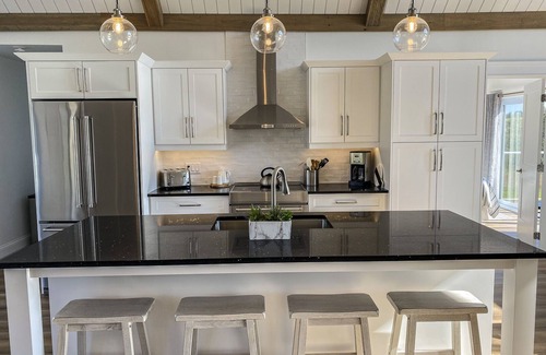 French River House | Cannon Creek - NEW spacious waterfront property with hot-tub.