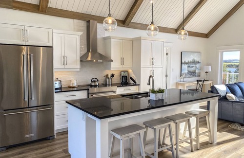 French River House | Cannon Creek - NEW spacious waterfront property with hot-tub.