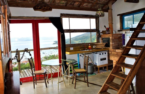 Ilhabela Historical Center Ski Chalet | CantaGalo Ilhabela rustic and cozy from where you can see the sea and the hills of the island.