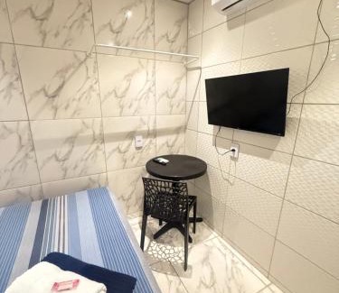 Alto da Boa Vista House | Cantinho aconchegante - Quarto 05 AR-condicionado