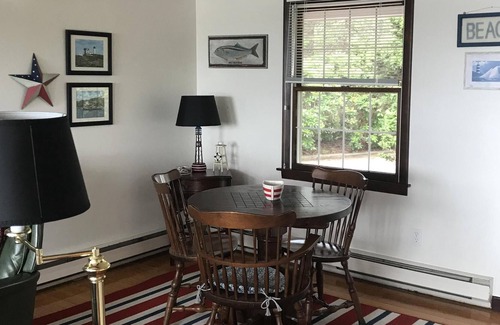 Mashpee Neck House | Cape Cod Waterfront Vacation Home dock and 2 kayaks: