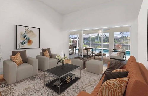 Pelican House | Cape Coral Cover: 3-bedroom Pool Home on a Canal Home with WiFi and AC