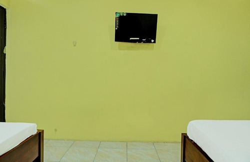 South Ogan Komering Ulu Hotel | Capital O 92316 Wisma Widya Loka Pratama Near Futsal Tebing Gading