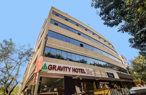 Kukatpally Housing Board Colony Hotel | Capital O Hotel Gravity Near Nexus Hyderabad