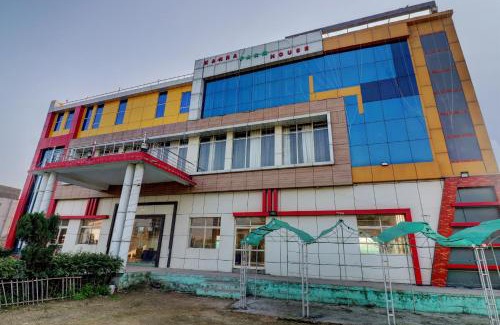 Sikandra Rao Hotel | Capital O Kanha Resort