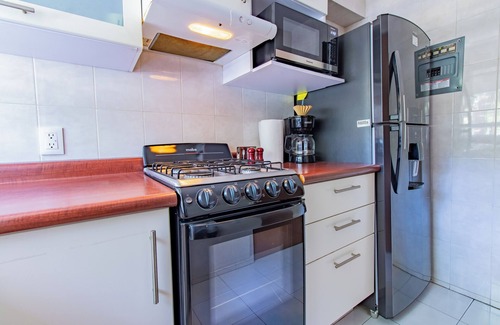 Anahuac Condo | Capitalia - Cozy & Stylish -w/GYM