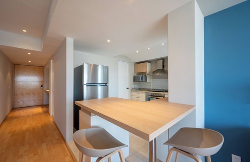 El Yaqui Condo | Capitalia - Luxurious Urban Retreat