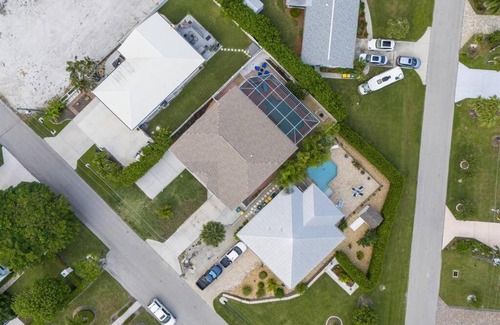 Isles of Capri House | Capri Charm Remodeled Oasis w/Heated Pool-Kayaks