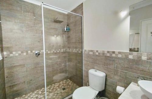 Robberg Beach Apartment | Capricorn Studio One - 150m to Solar Beach, Patio & Braai, Wifi, DSTV & Netflix