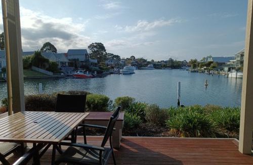 Paynesville Apartment | Captains Cove Resort - Waterfront Apartments