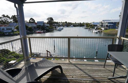 Paynesville Apartment | Captains Cove Resort - Waterfront Apartments
