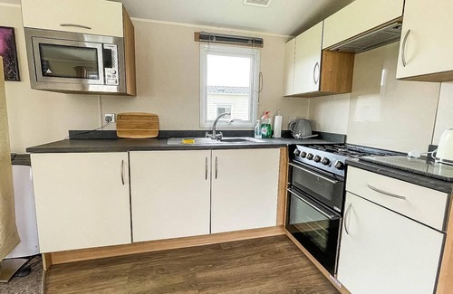 Felixstowe House | Caravan at Suffolk Sands Holiday Park with decking and WiFi ref 45023A