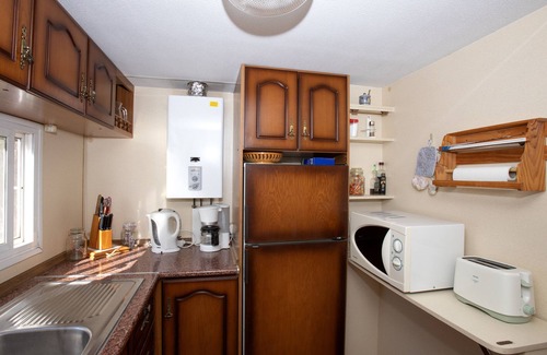 Mutxamel RV Rental | Caravan 'Mobilhome Mit Garten Und Pool' with Shared Pool, Wi-Fi and Air Conditioning