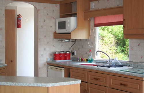 Beddgelert House | Caravan own private garden. lit car park, secluded open aspect, Mountain views.