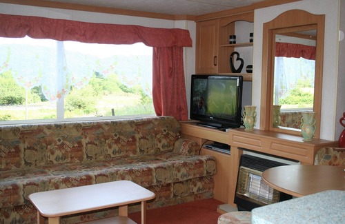 Beddgelert House | Caravan own private garden. lit car park, secluded open aspect, Mountain views.