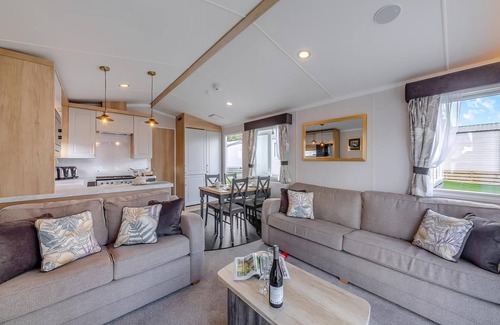 Waren Mill House | Caravan with one double and two twin.