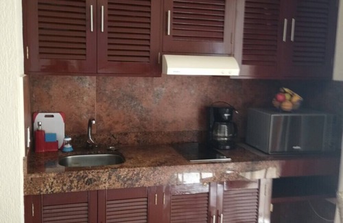 Puerto Juarez Condo | Caribbean sea is waiting for you at a discount with condo on the beach & pools