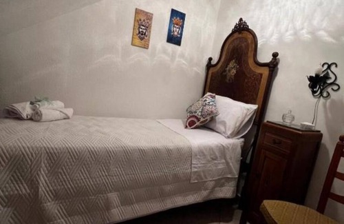 Belpasso House | Carmelina's Home: the home of traditions. Deluxe Room