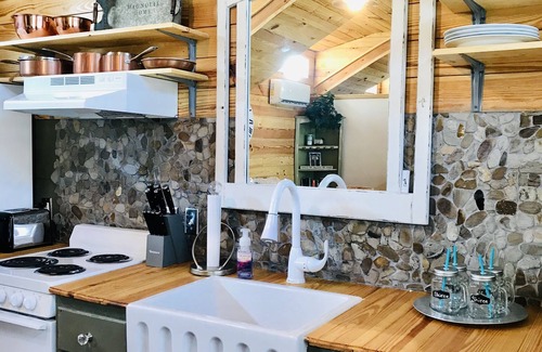 Cordova House | “CAROLINA” tiny house with Pond View