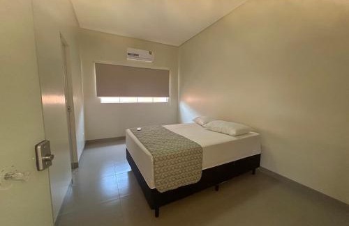 Plano Diretor Sul House | Casa 04 - Casa com 2 quartos, sendo uma suíte localizada próximo a rodoviária e o aeroporto