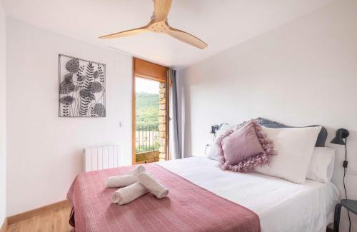 Ager House | Casa acollidora i familiar amb jardi i barbacoa