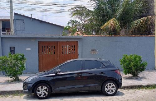 Itanhaem House | Casa aconchegante com churrasqueira e piscina para um ambiente familiar