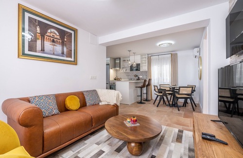 San Pedro Apartment | Casa al Andalus: Chic, Serene & Posh City Center Pad with WiFi and air conditioning!