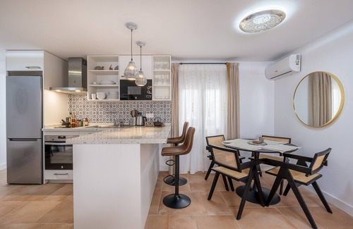 San Pedro Apartment | Casa al Andalus: Chic, Serene & Posh City Center Pad with WiFi and air conditioning!