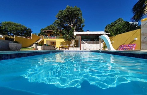 Cabo Frio House | Casa Amarela - Linda casa familiar com piscina na Reserva do Peró em Cabo Frio