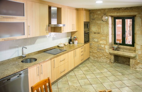 Cuntis House | Casa Belai in a rural setting with swimming pool, barbecue area and fireplace lounge.